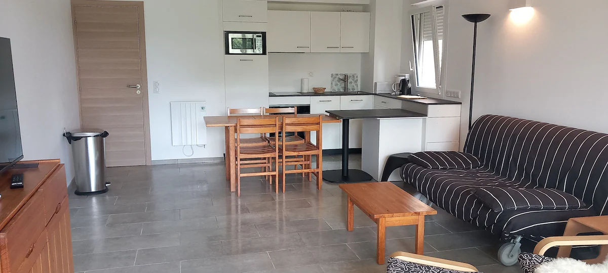 Open-plan living and dining room with the brand-new 2024 fitted kitchen