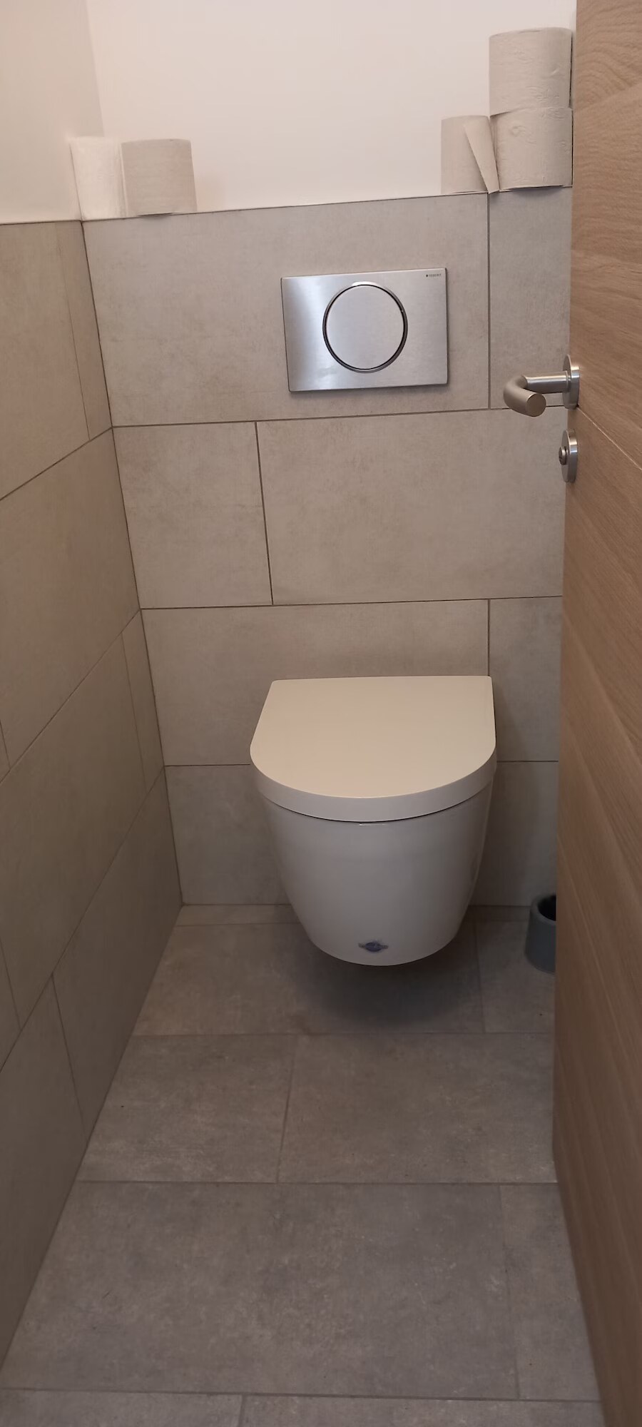 Separate WC with modern tiling, renovated in 2024